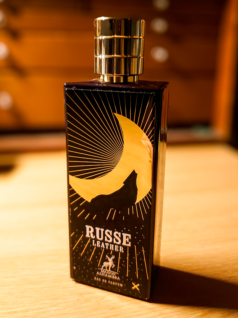 80ml bottle of Russe Leather fragrance by Maison Alhambra