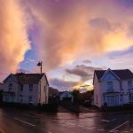 Sunset behind two traditional detached houses on Station Road, Ystradgynlais